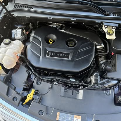 Engine bay degreased and dressed with EcoBoost cover